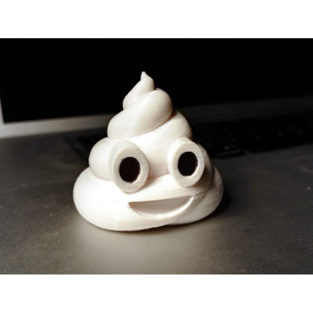 Эмодзи «Куча какашек» (U+1F4A9)