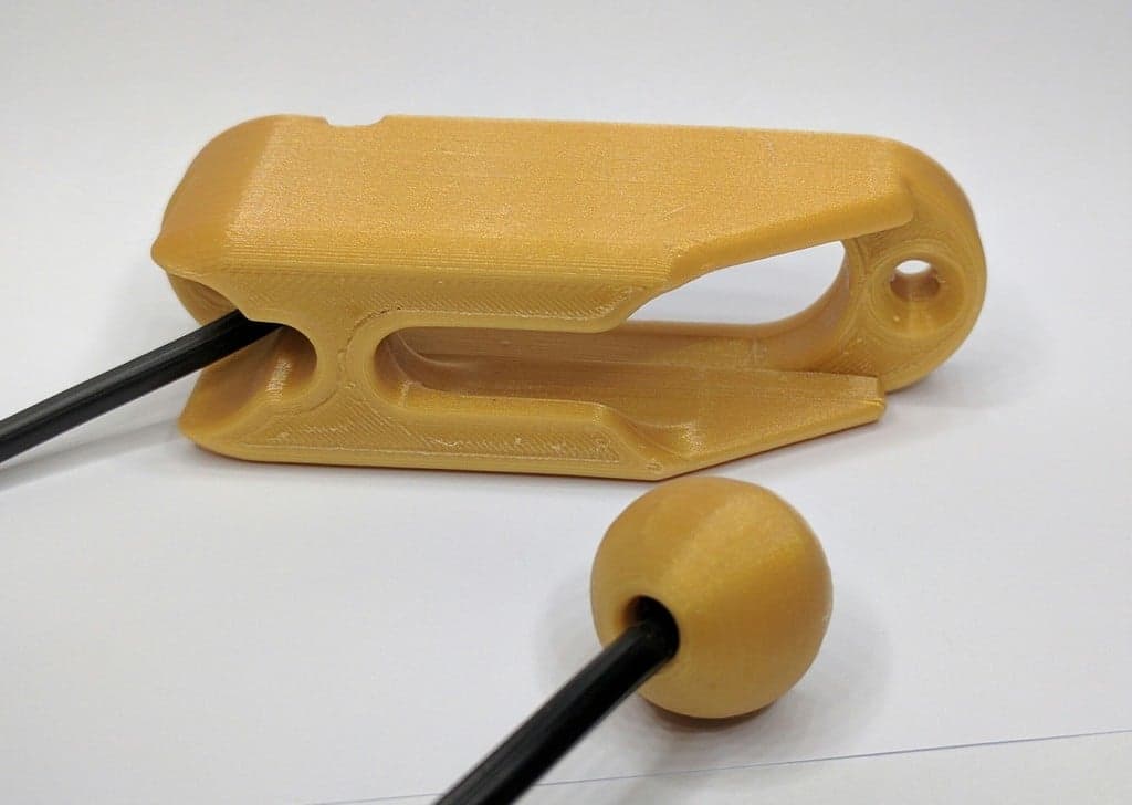 Держатель веревки, кабеля или шнура и шарик.