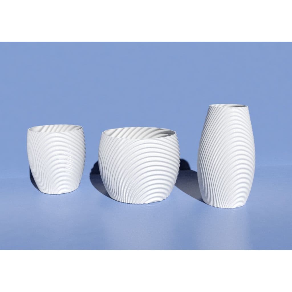 Волнистая органическая миска, чашки, ваза и цветочный горшок.