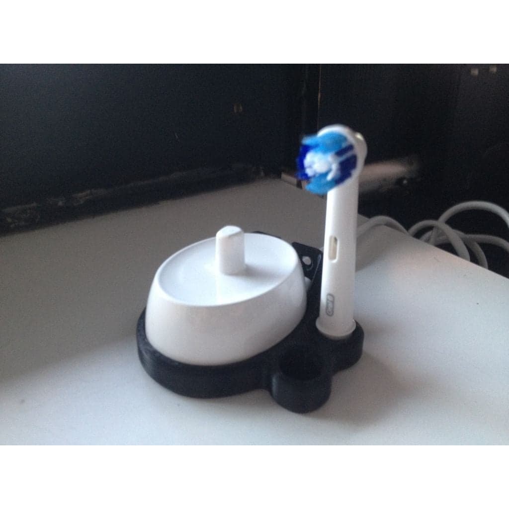 Настенное крепление для электрической зубной щетки Oral B.