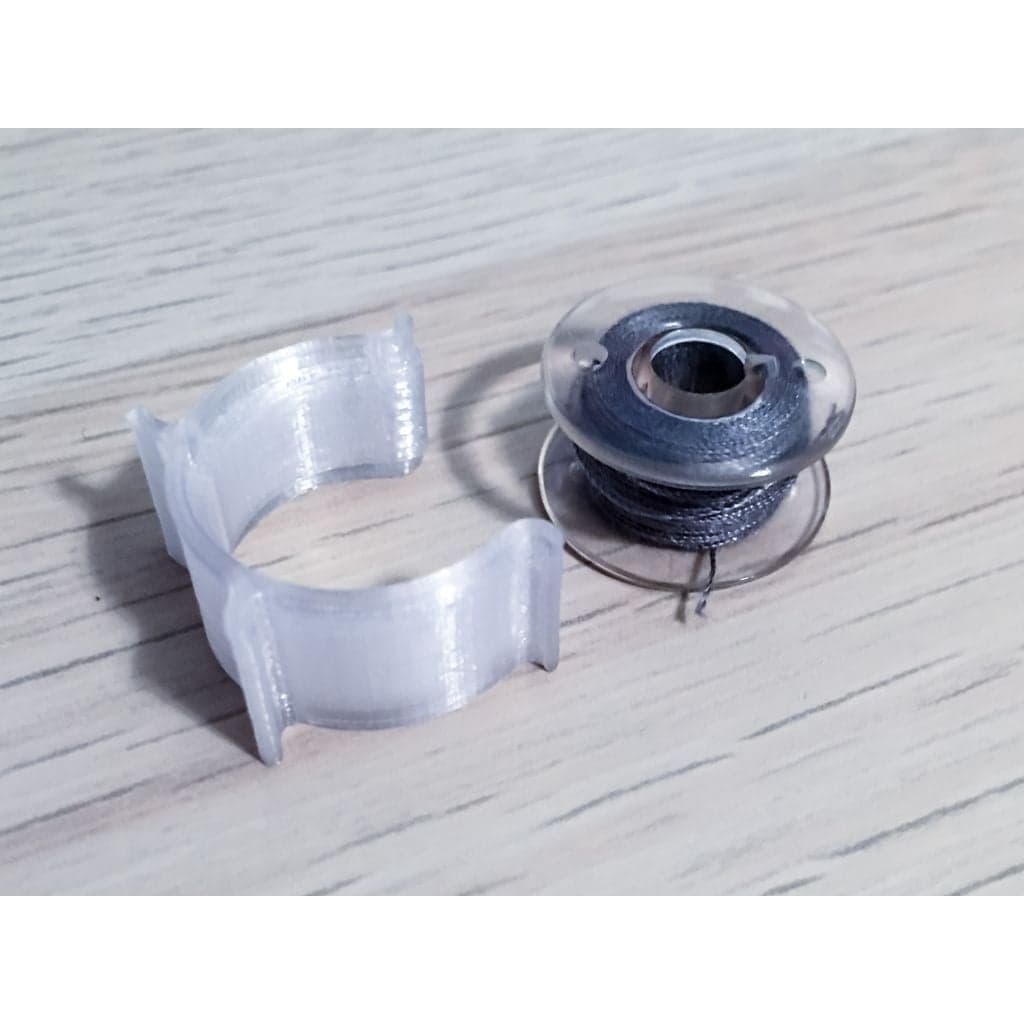 Улучшенный зажим для шпульки