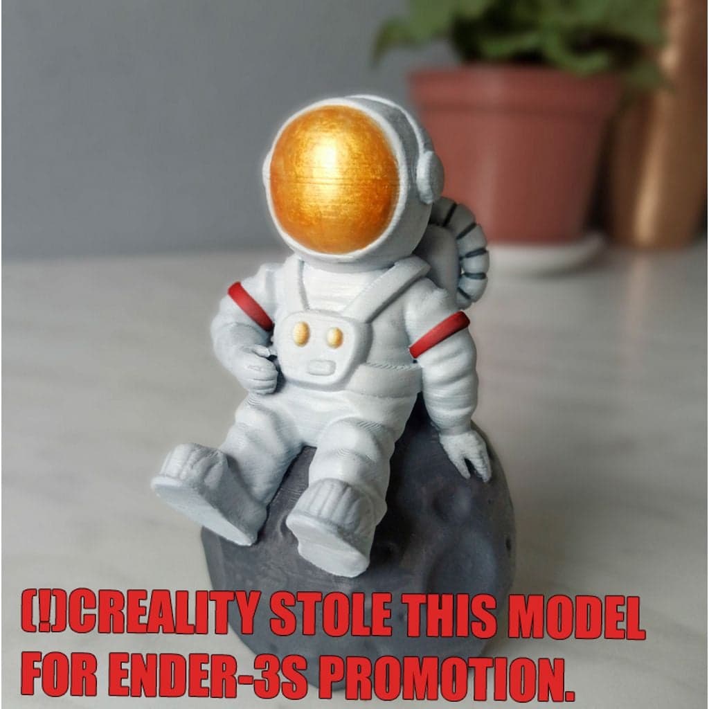 Астронавт сидит на Луне, модель для печати