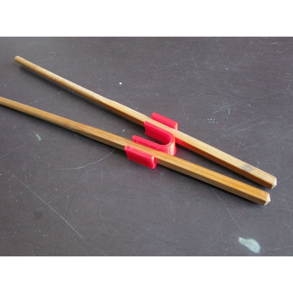 Тренажер для палочек для еды